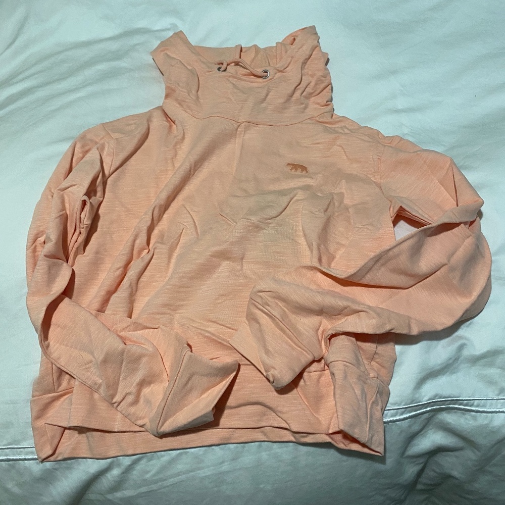 running bare orange shirt